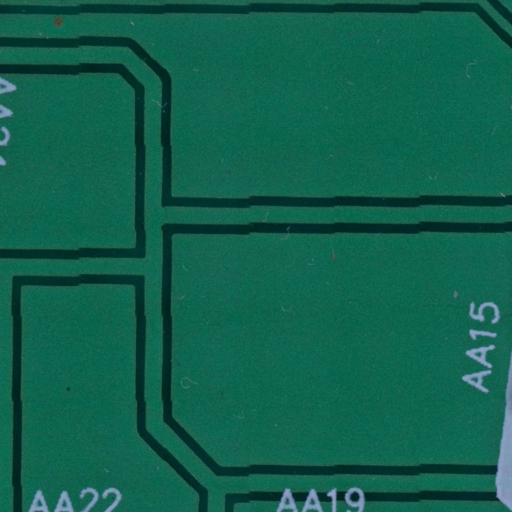 Stitched image from the microscope shots, with blended seams but the features don't align properly anyway